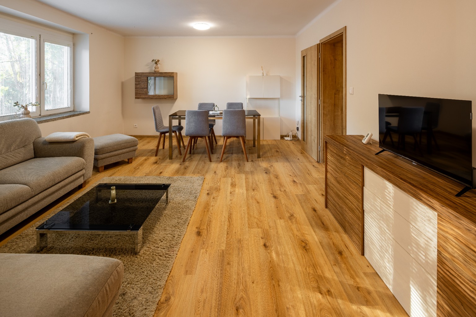 Comfortable living room at Business 2BR Apartment